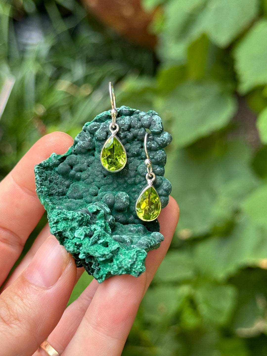 Pear Cut Peridot Dangle Earrings in Sterling Silver