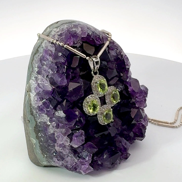 Round Cut Peridot & White Topaz Cross Necklace in Sterling Silver