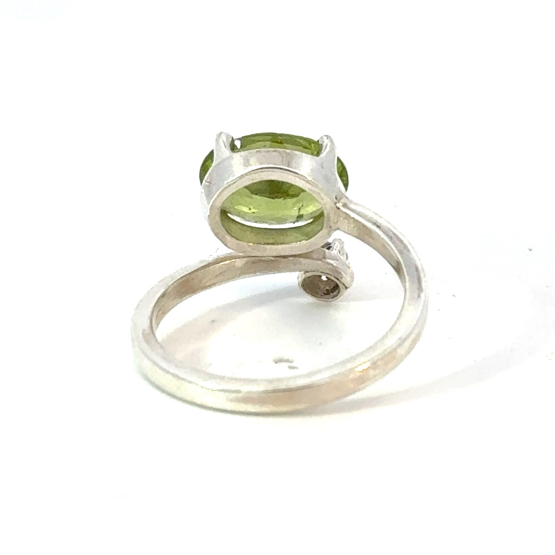 Oval Cut Peridot and Cubic Zirconia Ring in Sterling Silver