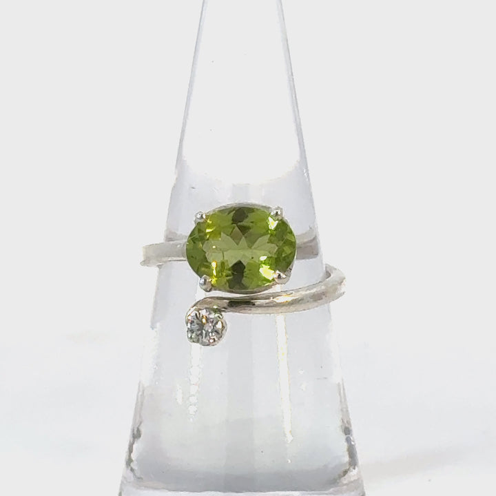 Oval Cut Peridot and Cubic Zirconia Ring in Sterling Silver