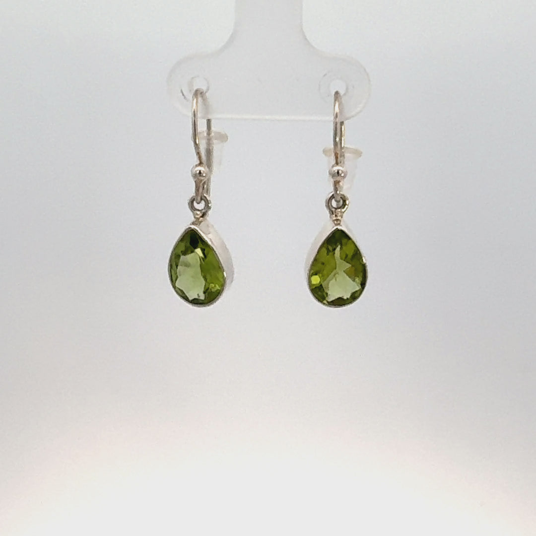 Pear Cut Peridot Dangle Earrings in Sterling Silver