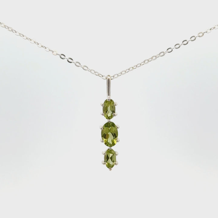 Faceted Oval 3-Stone Peridot Necklace Set in Sterling Silver