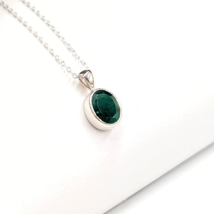 Faceted Oval-Cut Emerald Necklace Set in Sterling Silver