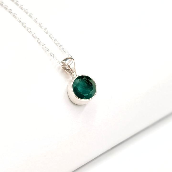 Faceted Round-Cut Emerald Necklace Set in Sterling Silver