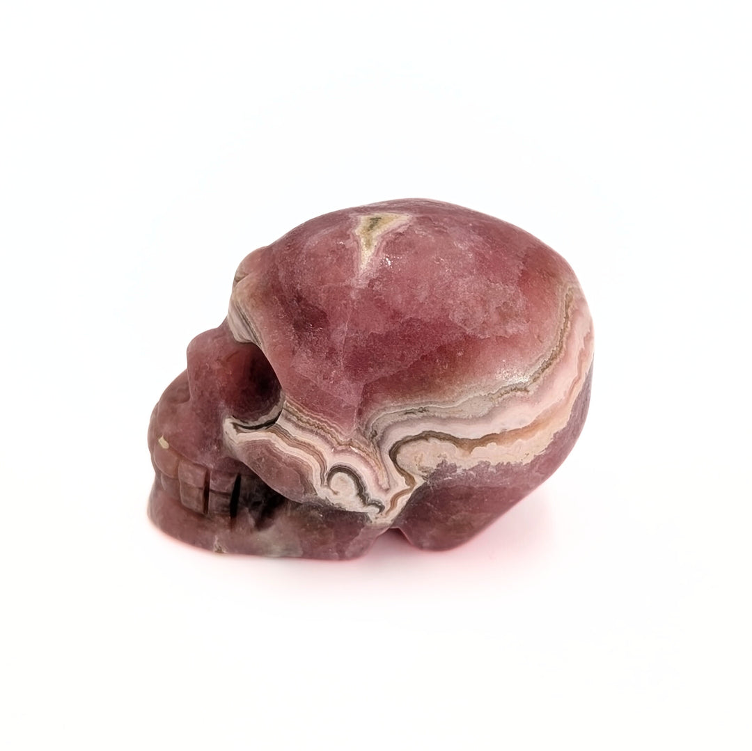 Rhodochrosite Carved Skull Figurine
