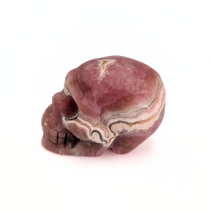 Rhodochrosite Carved Skull Figurine