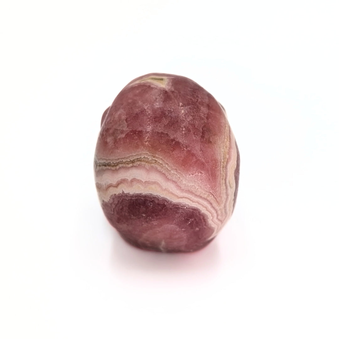 Rhodochrosite Carved Skull Figurine