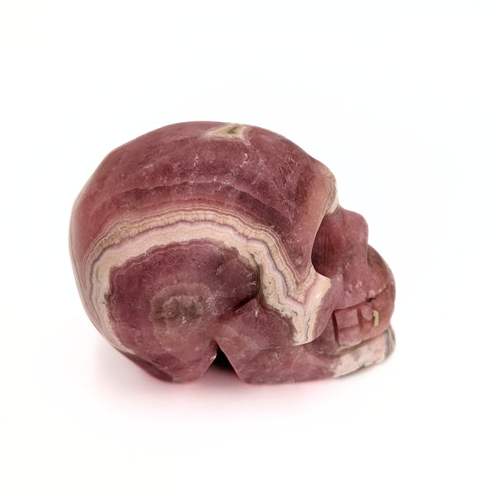 Rhodochrosite Carved Skull Figurine