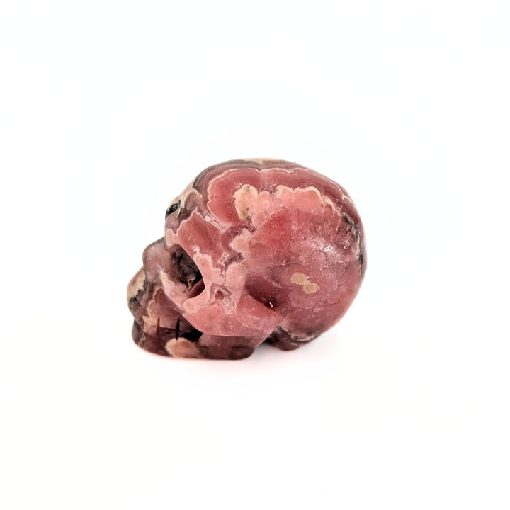 Rhodochrosite Carved Skull Figurine