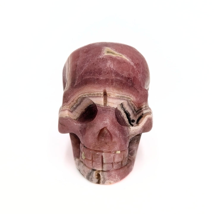 Rhodochrosite Carved Skull Figurine