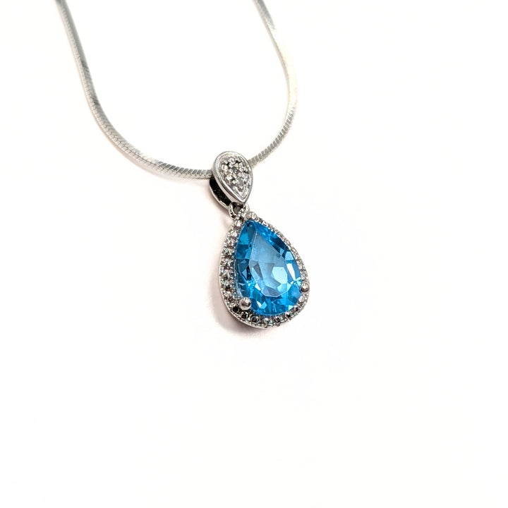 Blue Topaz & Diamond Necklace in Sterling Silver
