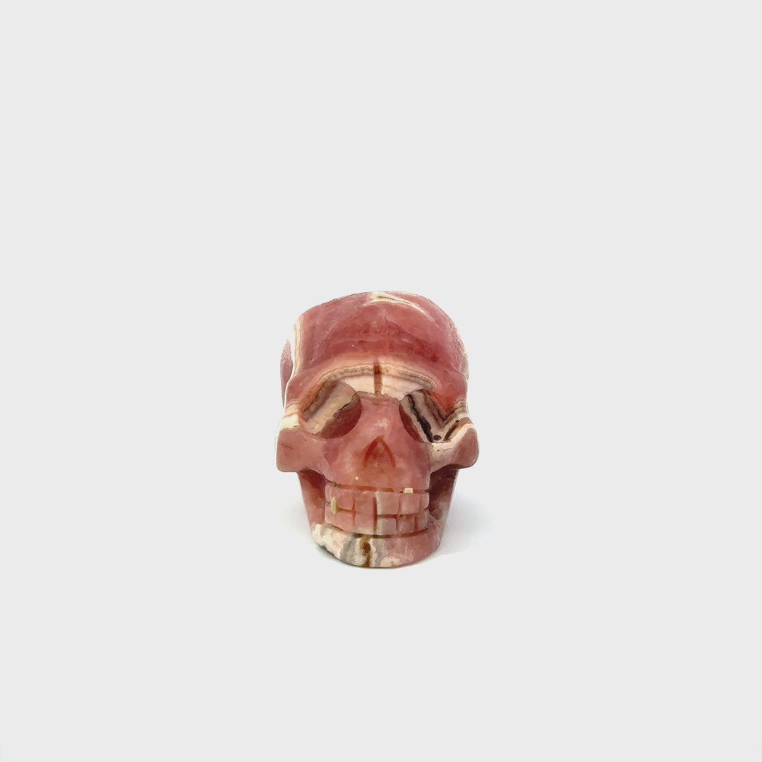 Rhodochrosite Carved Skull Figurine