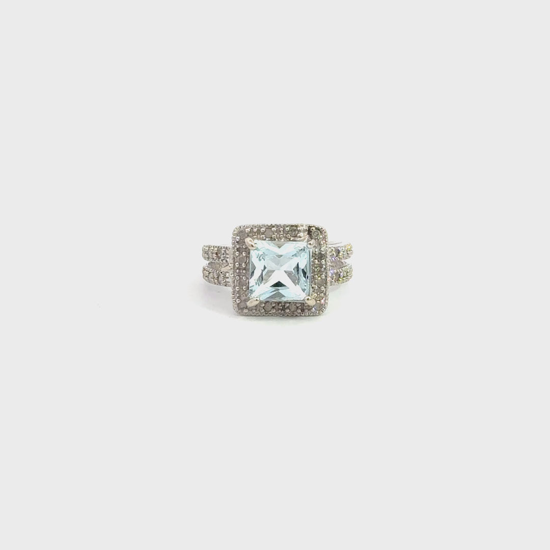Blue Topaz & Diamond Halo Ring in 14K White Gold