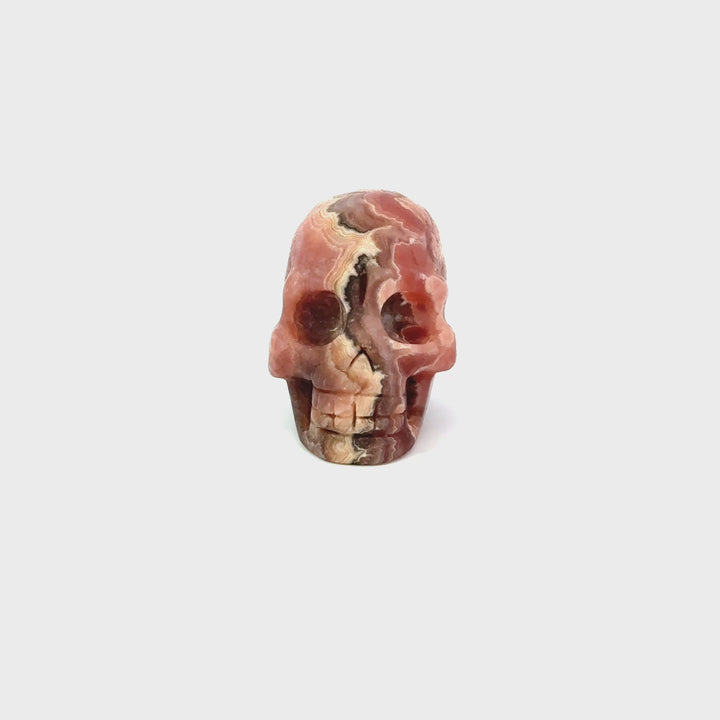 Rhodochrosite Carved Skull Figurine