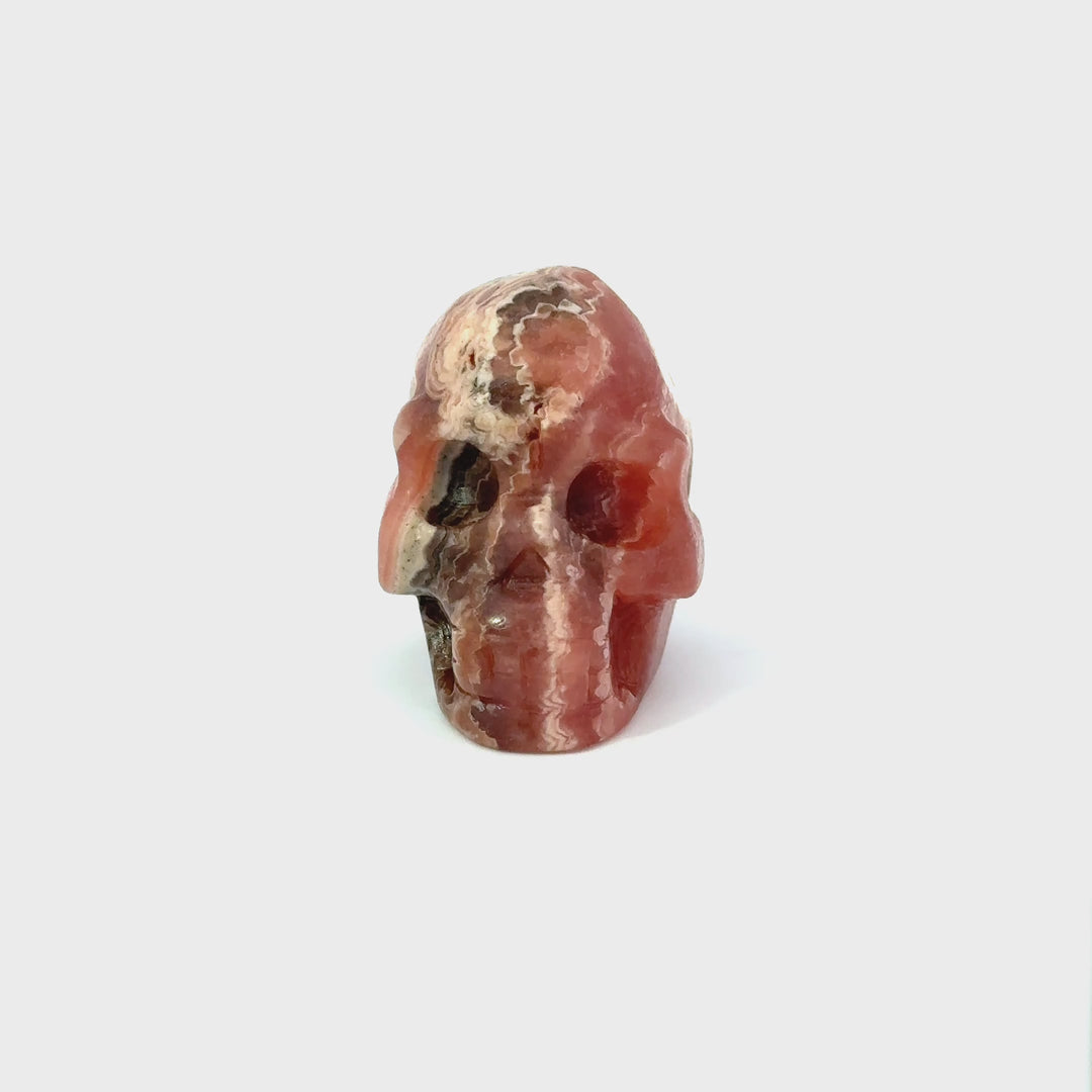 Rhodochrosite Carved Skull Figurine